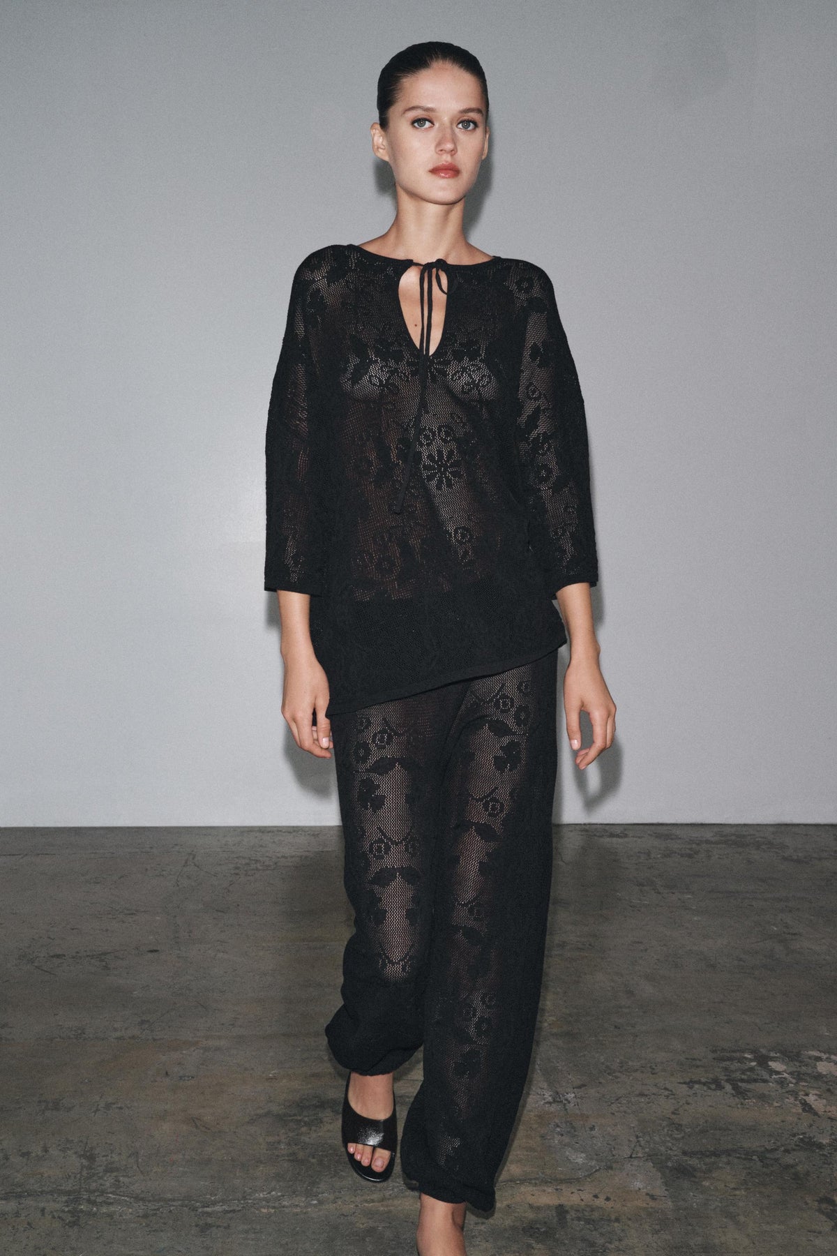 FLORAL STRUCTURE KNIT TROUSERS - Image 1