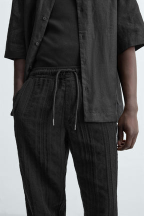 RELAXED FIT TEXTURED TROUSERS - Image 5