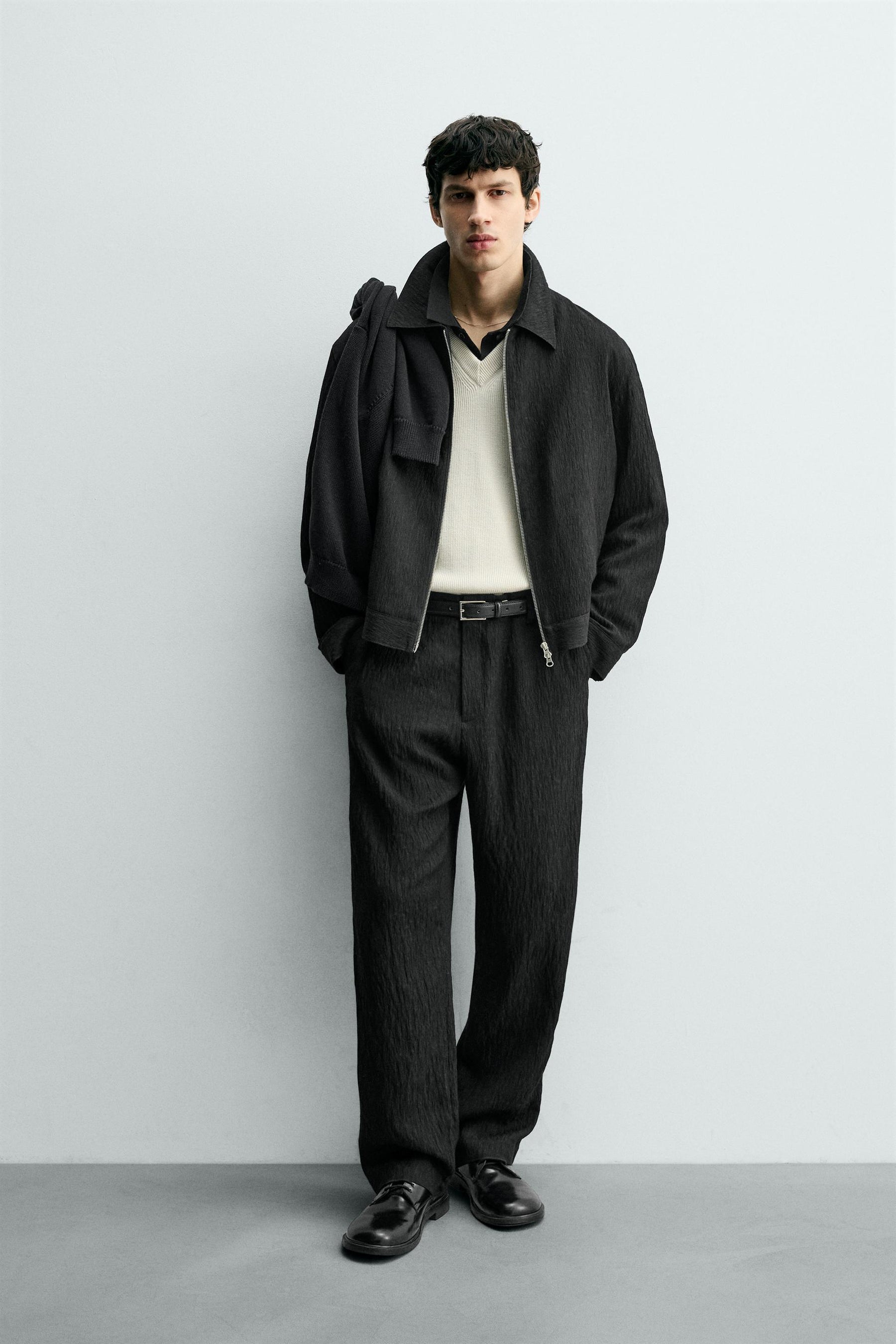 REGULAR FIT TROUSERS WITH IRREGULAR TEXTURE - Image 1