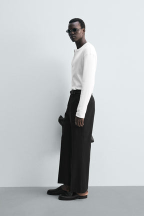 LOOSE-FITTING FLARED TROUSERS - Image 4