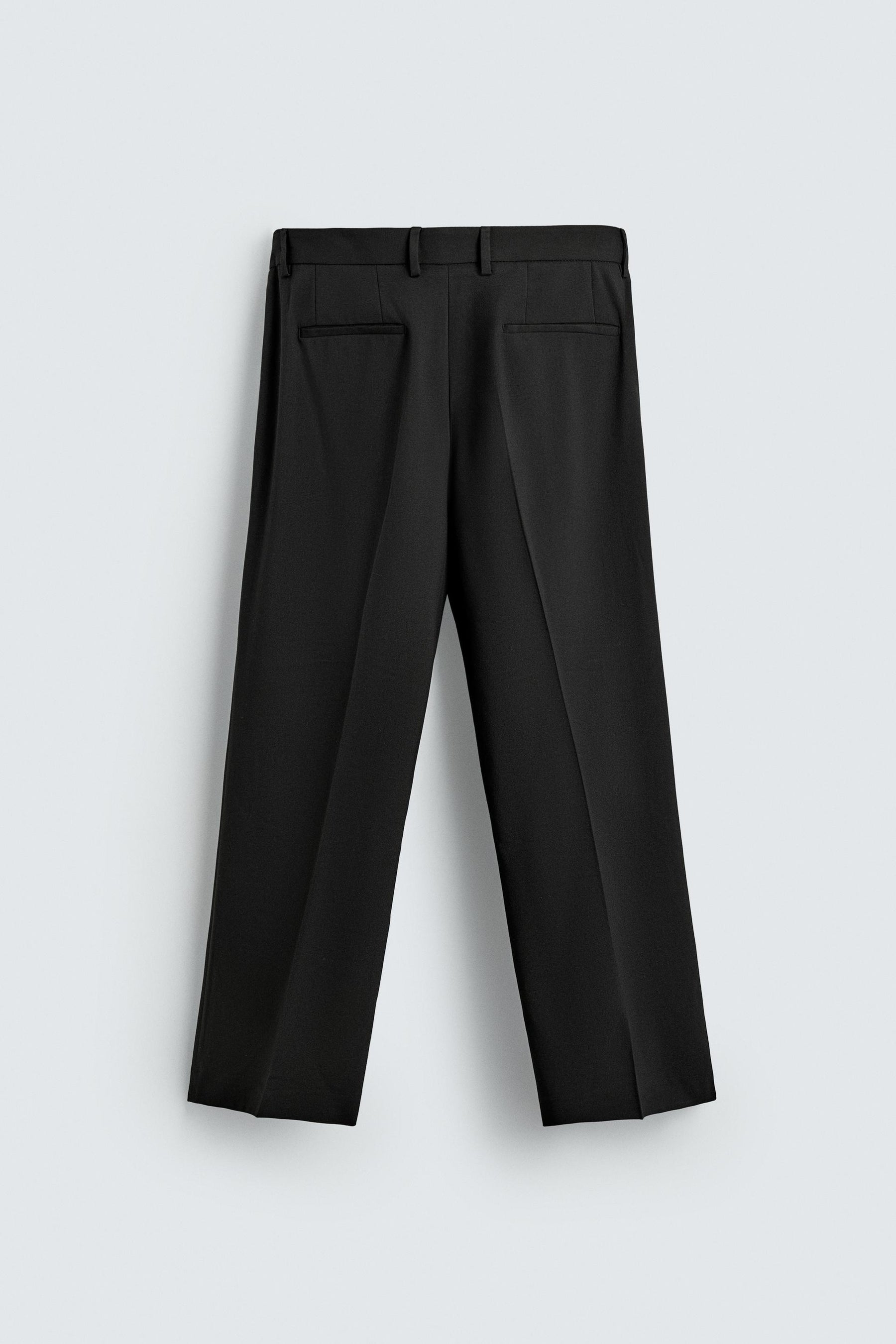 LOOSE-FITTING FLARED TROUSERS - Image 9