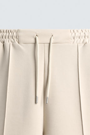 INTERLOCK BERMUDA SHORTS WITH LABEL - Image 10