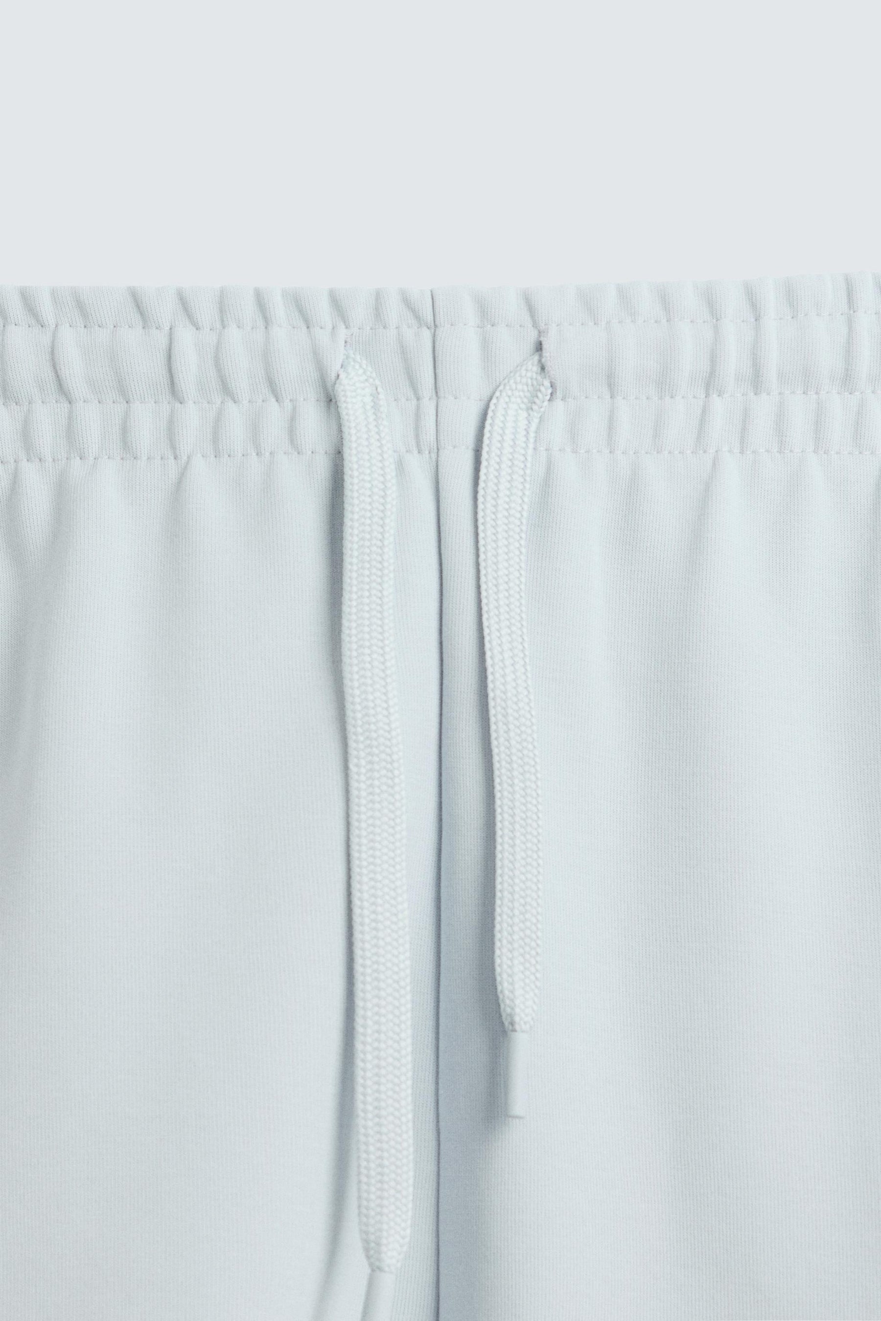 TECHNICAL INTERLOCK BERMUDA SHORTS - Image 8