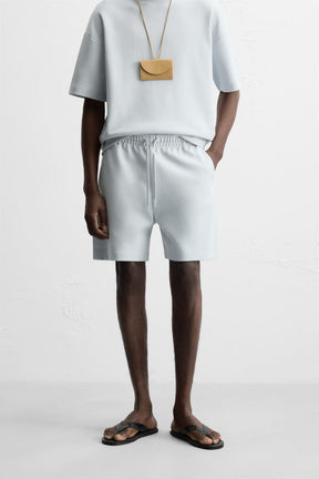 TECHNICAL INTERLOCK BERMUDA SHORTS - Image 2
