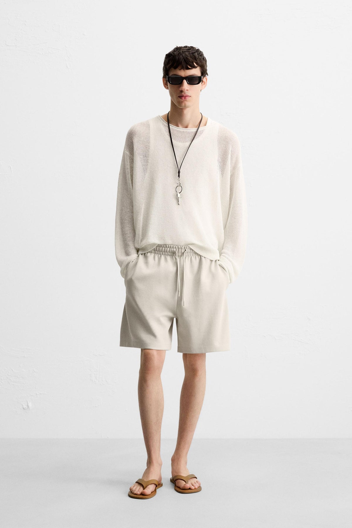 TECHNICAL INTERLOCK BERMUDA SHORTS - Image 1