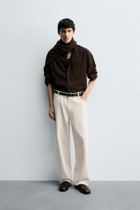 TEXTURED STRIPED JEANS - Image 1