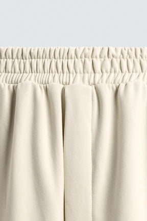 WIDE-LEG JOGGER TROUSERS WITH SIDE TAPING - Image 9