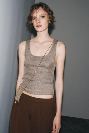 Textured metallic thread top