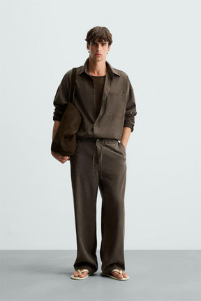 RELAXED FIT FLOWING TROUSERS - Image 1