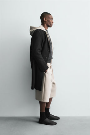 NEOPRENE-EFFECT BERMUDA SHORTS WITH DARTS - Image 4