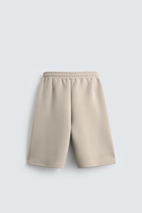 NEOPRENE-EFFECT BERMUDA SHORTS WITH DARTS - Image 6
