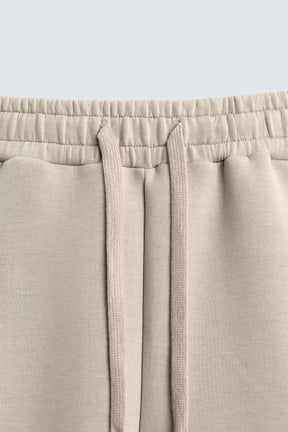 NEOPRENE-EFFECT BERMUDA SHORTS WITH DARTS - Image 7