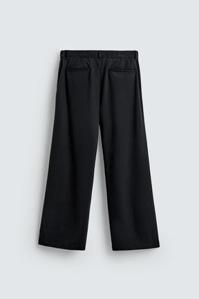 LOOSE-FITTING RELAXED FIT TROUSERS - Image 8