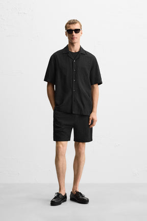 GEOMETRIC JACQUARD BERMUDA SHORTS - Image 1