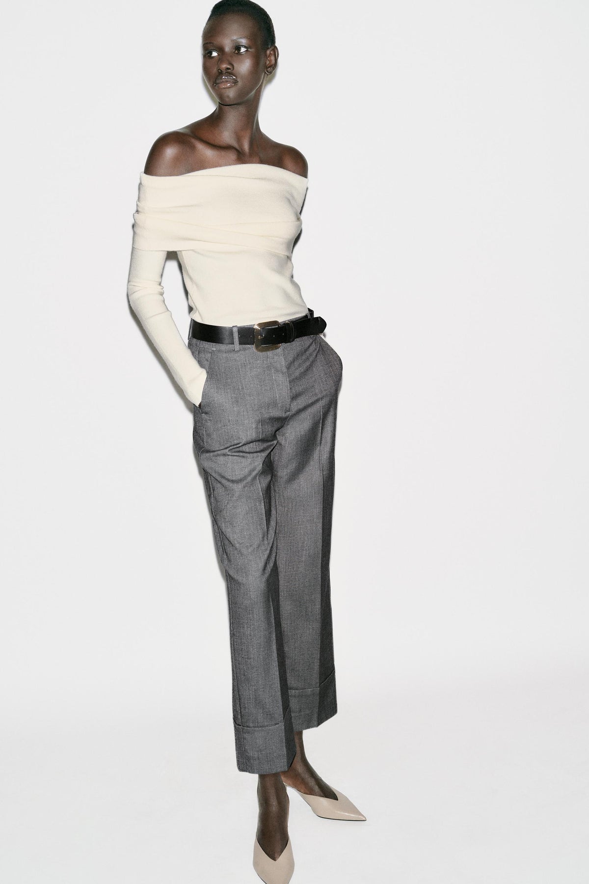 Trousers with turn-up hems.