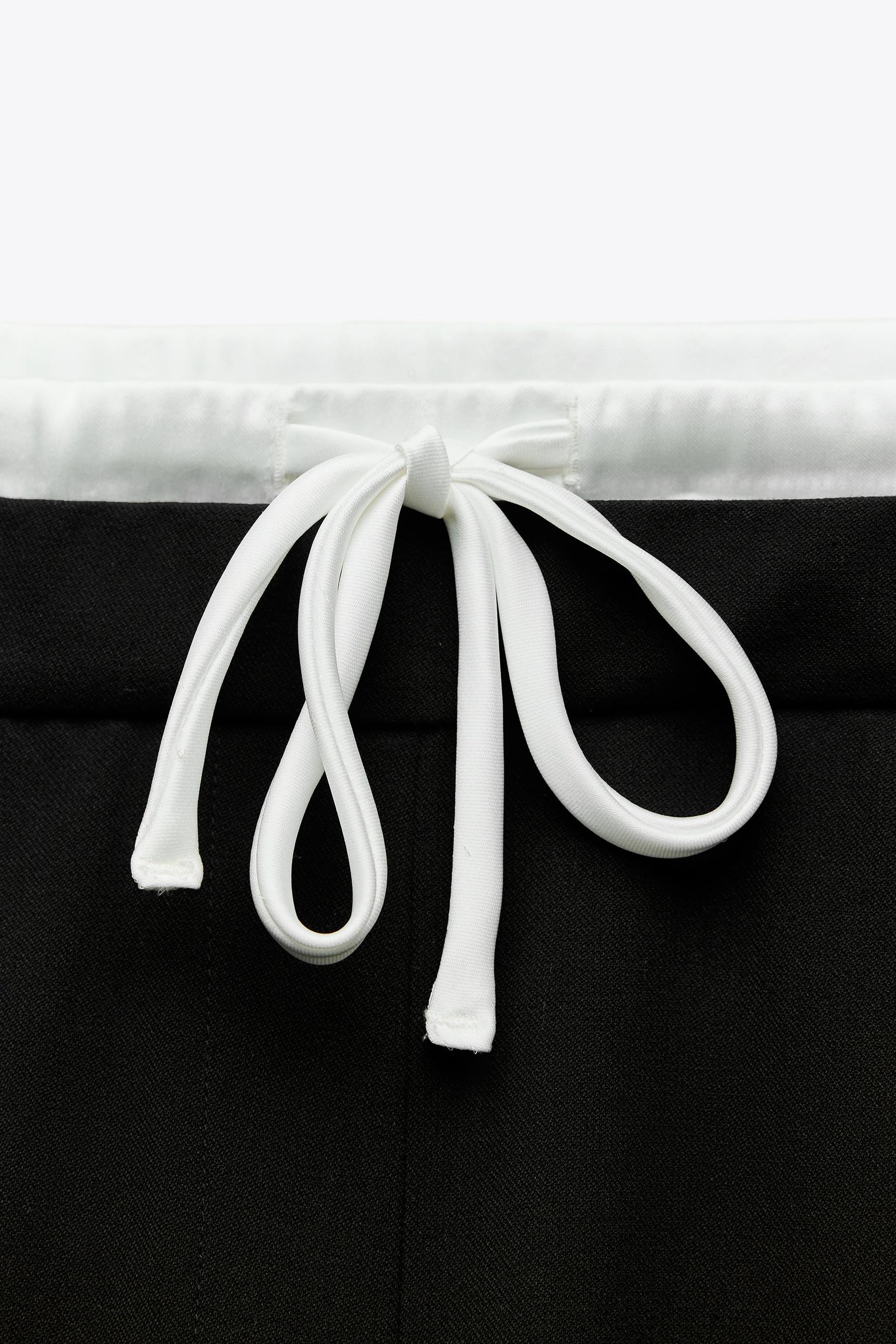 WIDE-LEG TROUSERS WITH WAISTBAND