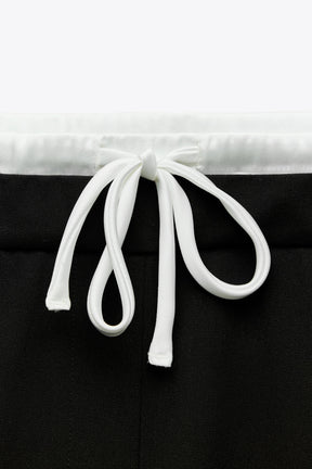 WIDE-LEG TROUSERS WITH WAISTBAND