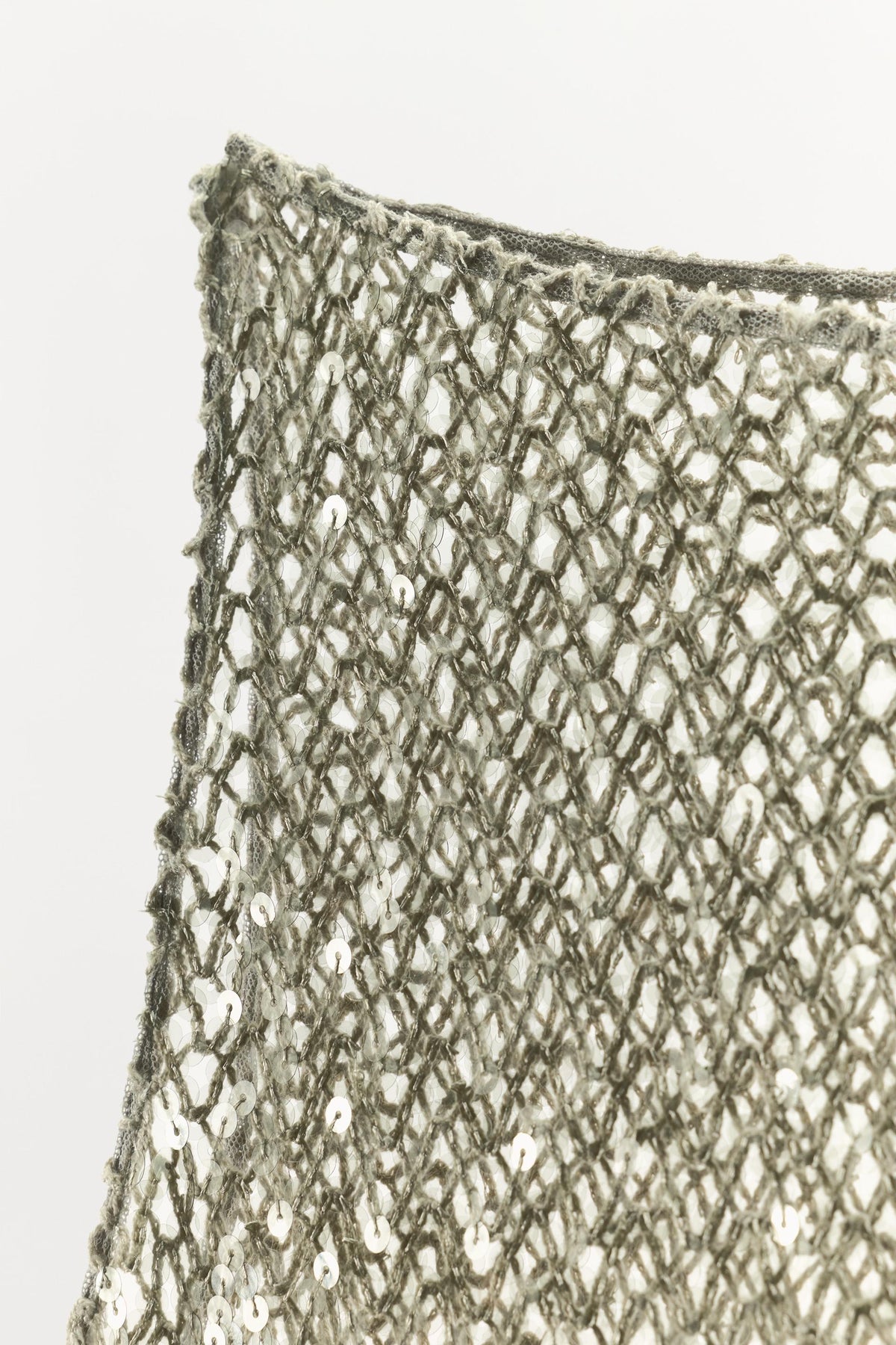 Sequinned Asymmetric Top