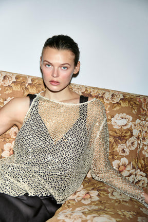 Sequinned Asymmetric Top