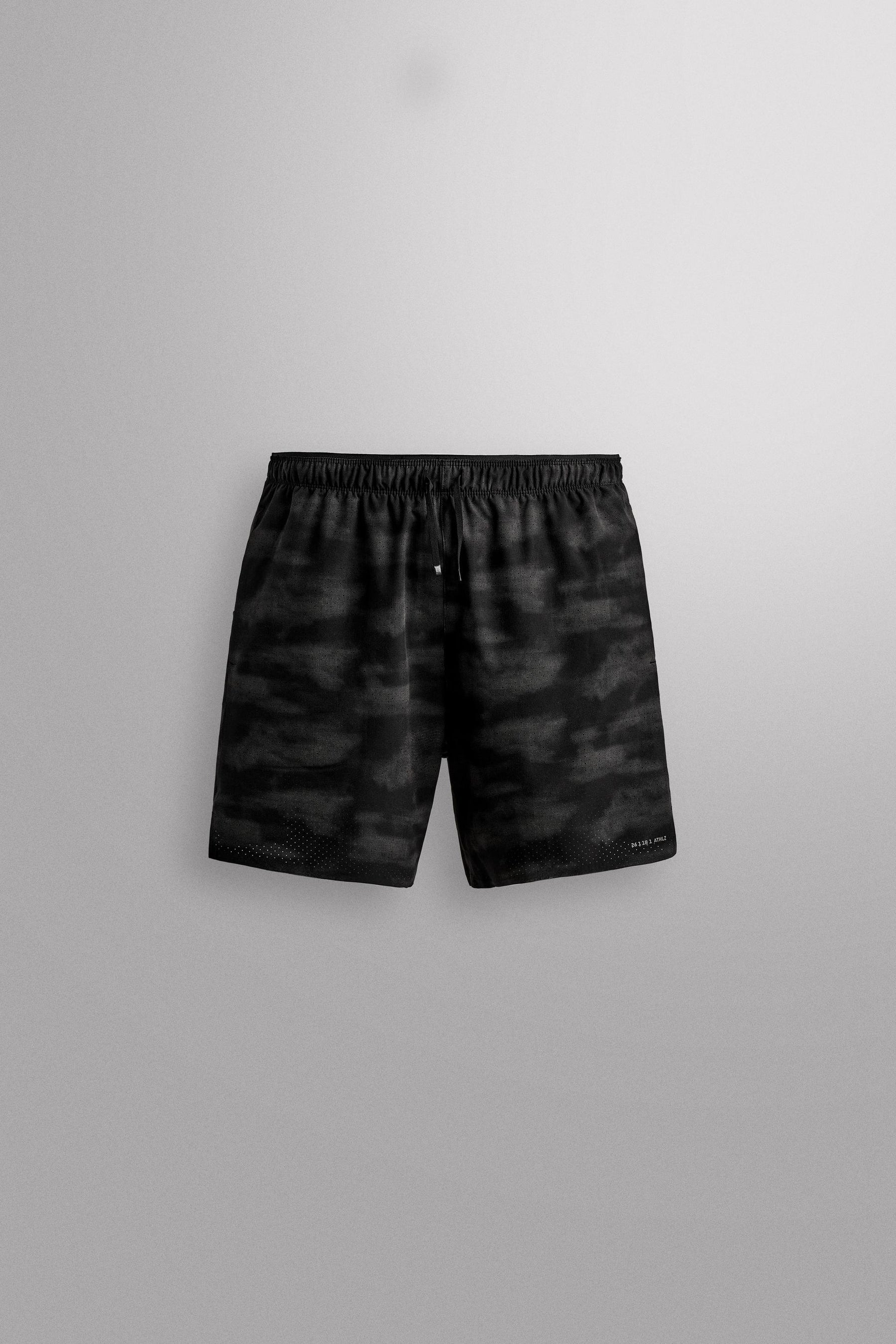 PERFORATED RUNNING SHORTS - Image 7
