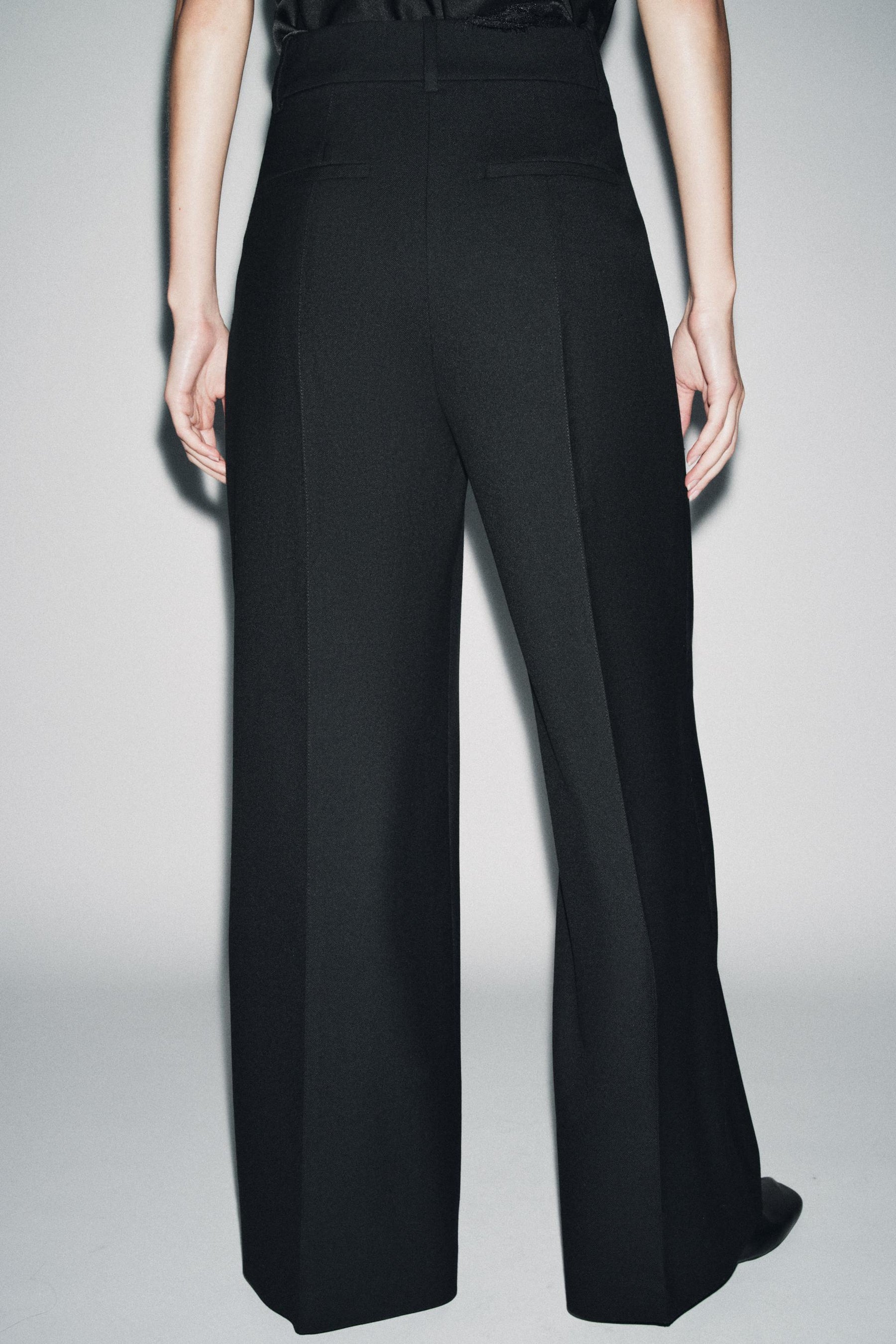 Wide-leg wool trousers