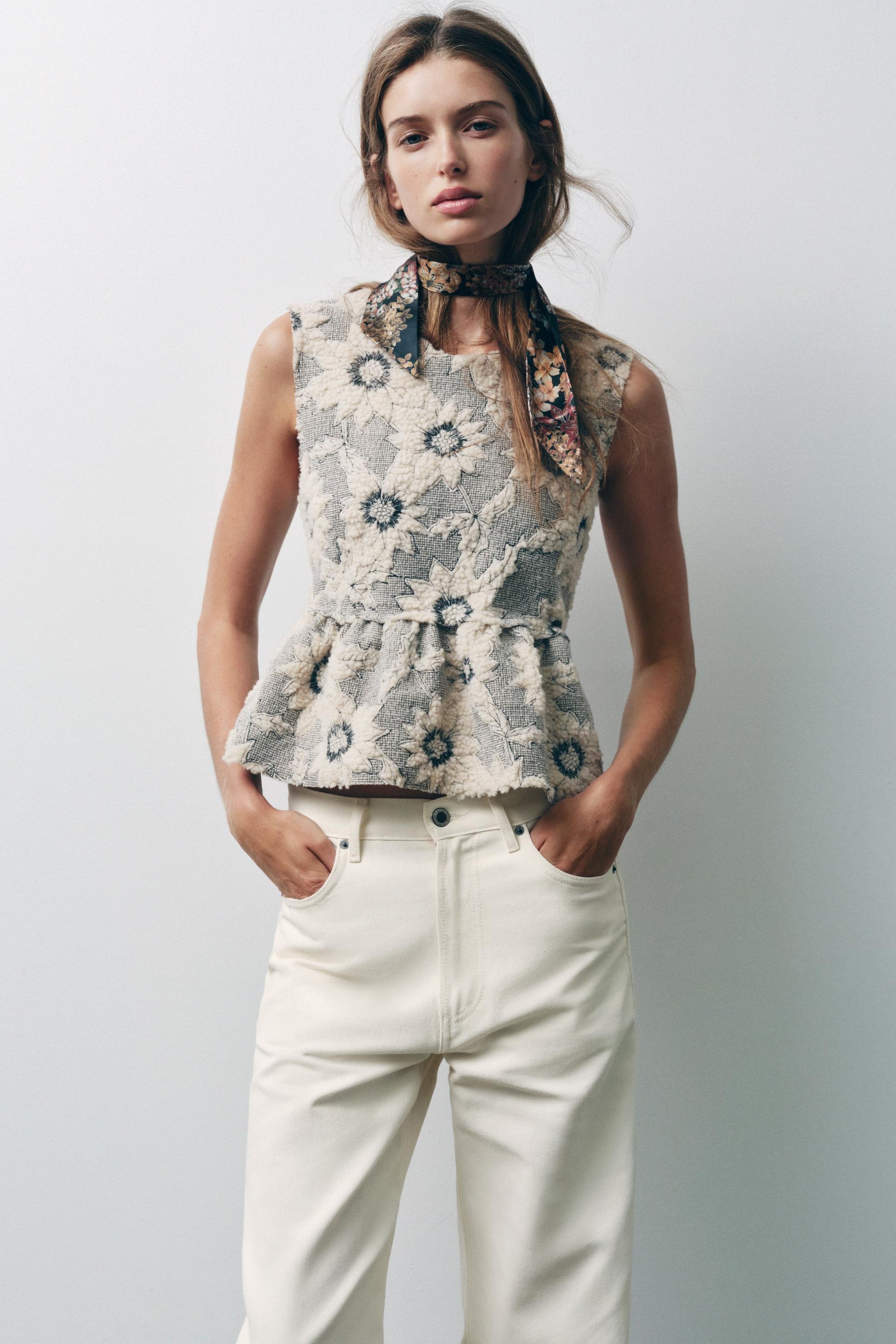 FLORAL TEXTURED PEPLUM TOP