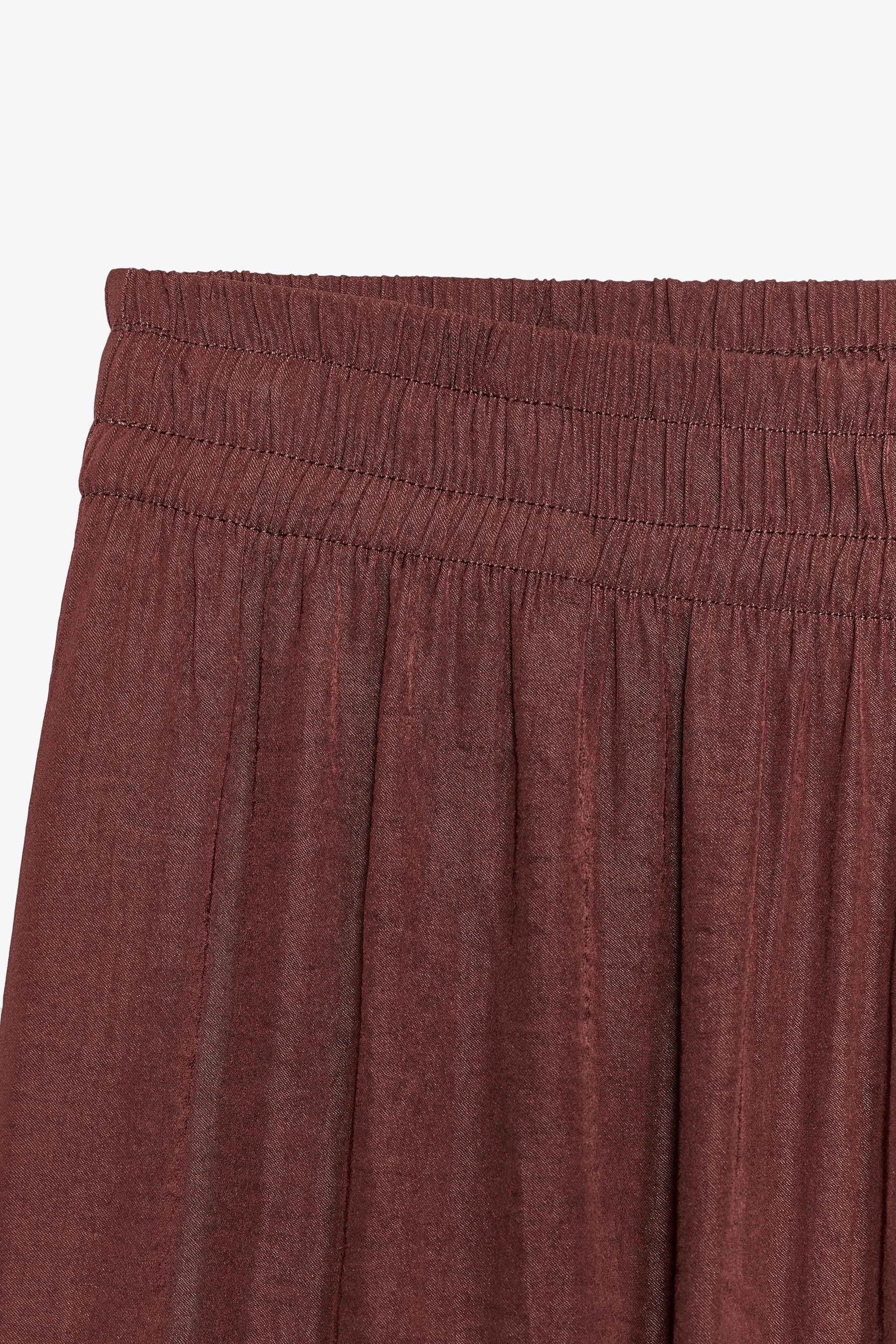 WIDE FLOWING TROUSERS