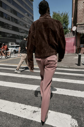 Straight-leg trousers with belt.