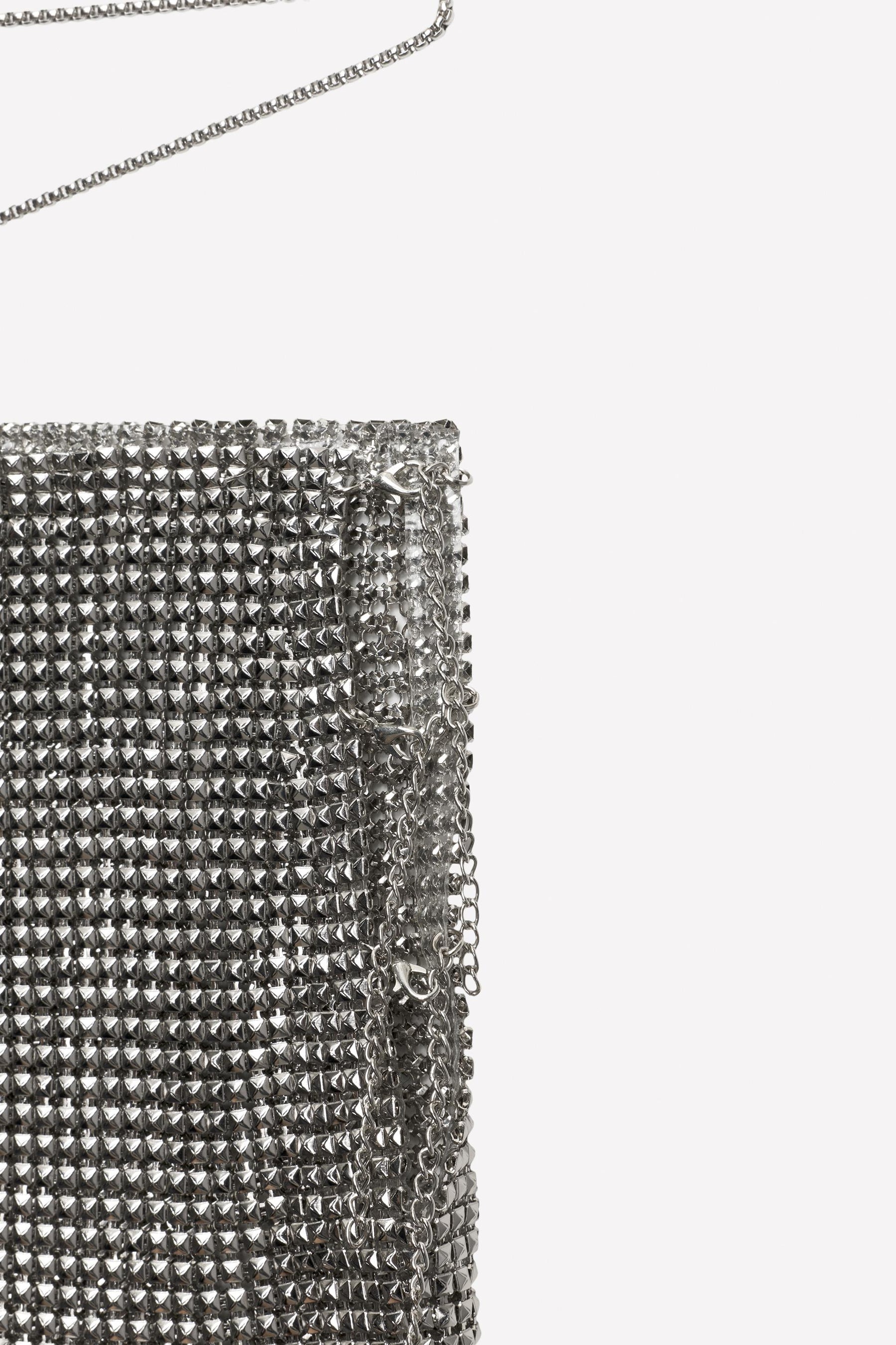 METALLIC MESH MINI SKIRT