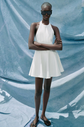 SHORT HALTER GODET DRESS - Image 1