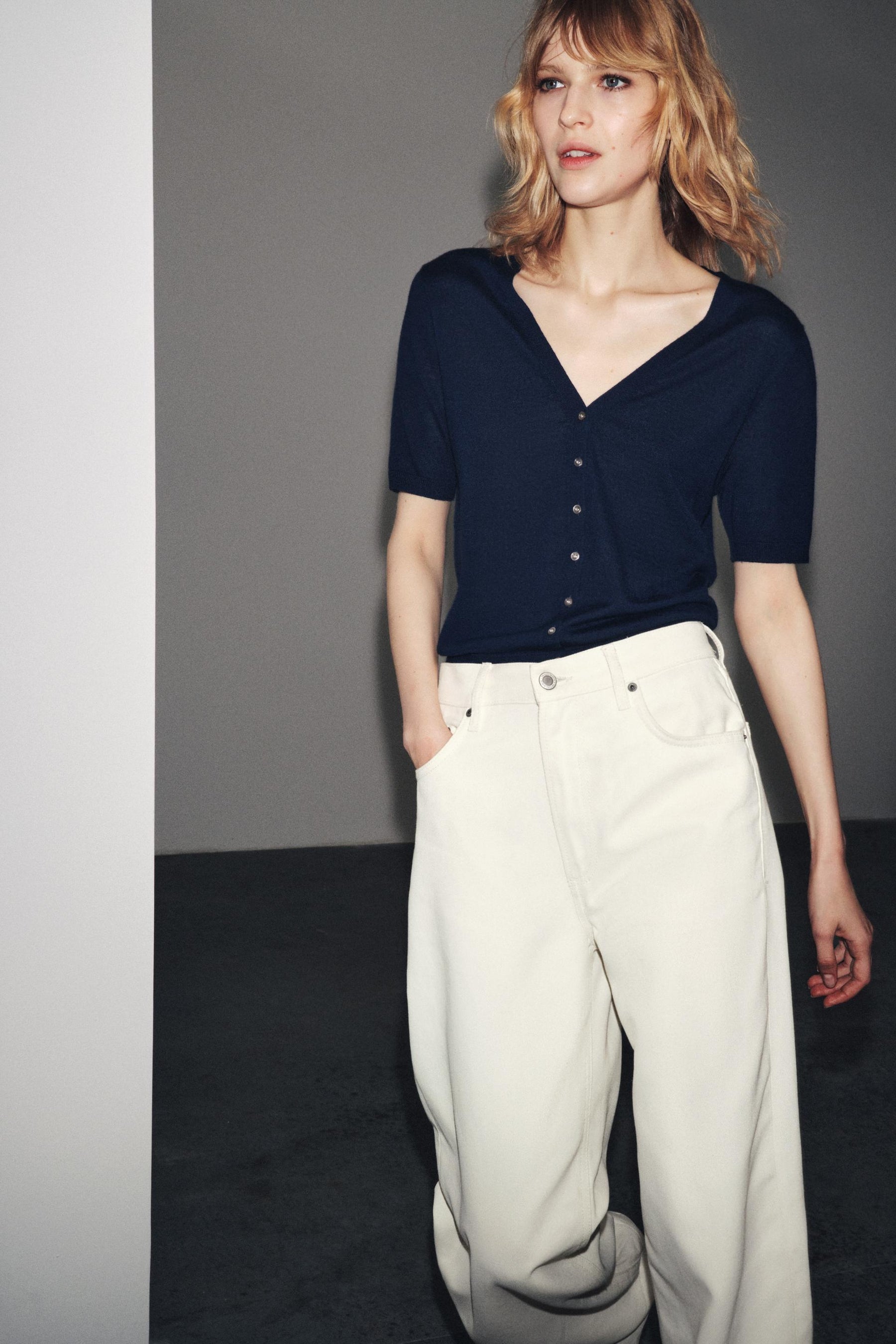 100% EXTRA FINE WOOL SHORT SLEEVE CARDIGAN - Image 1