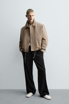 PLEATED TEXTURED TROUSERS - Image 1
