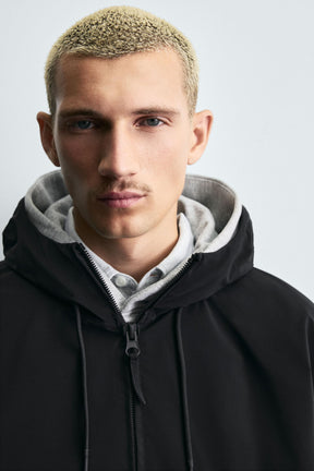 TECHNICAL HOODED JACKET - Image 5