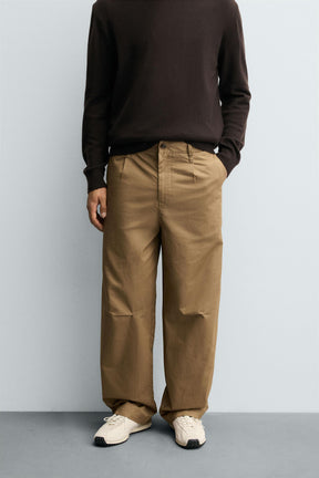 RELAXED FIT PLEATED CHINO TROUSERS - Image 2