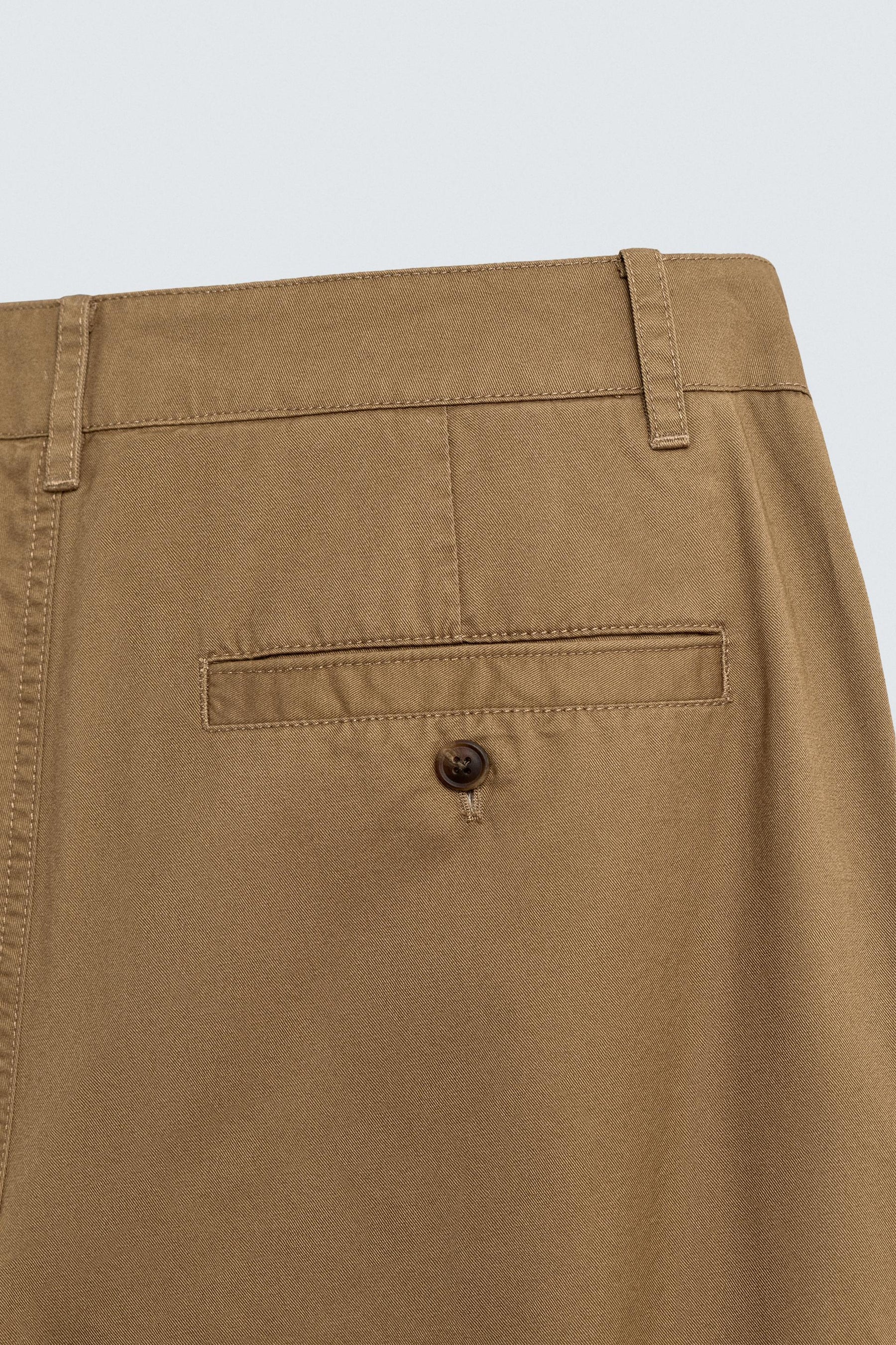 RELAXED FIT PLEATED CHINO TROUSERS - Image 10
