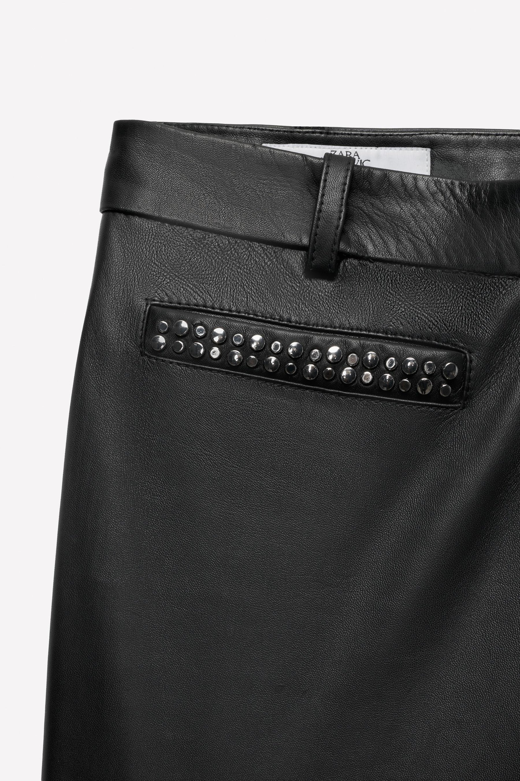 Studded leather flare trousers