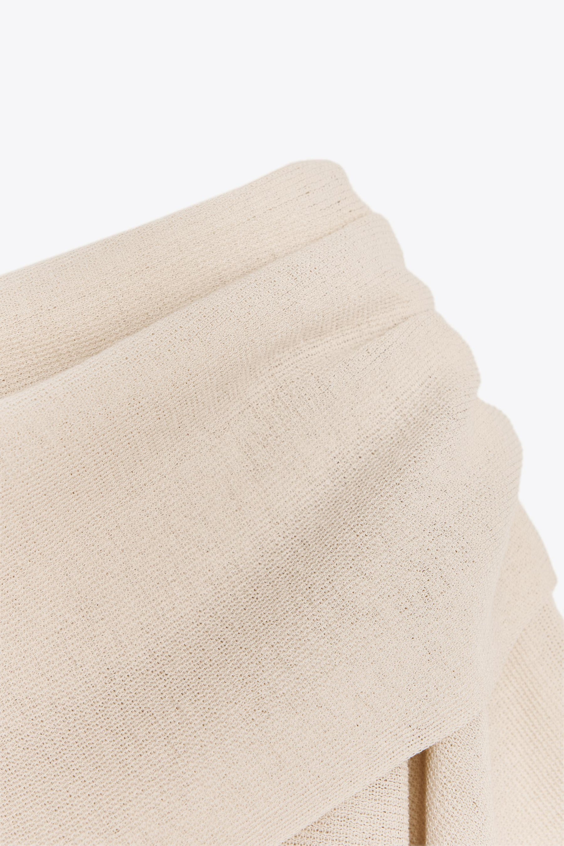 KNIT SHORT SLEEVE JUMPER