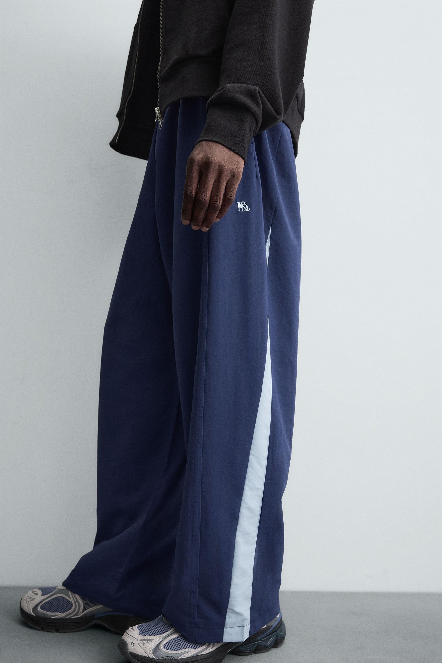 TECHNICAL TROUSERS WITH TAPING - Image 5
