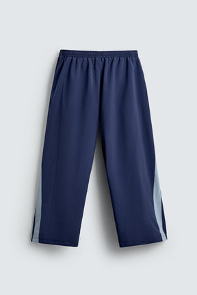 TECHNICAL TROUSERS WITH TAPING - Image 7