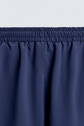 TECHNICAL TROUSERS WITH TAPING - Image 9