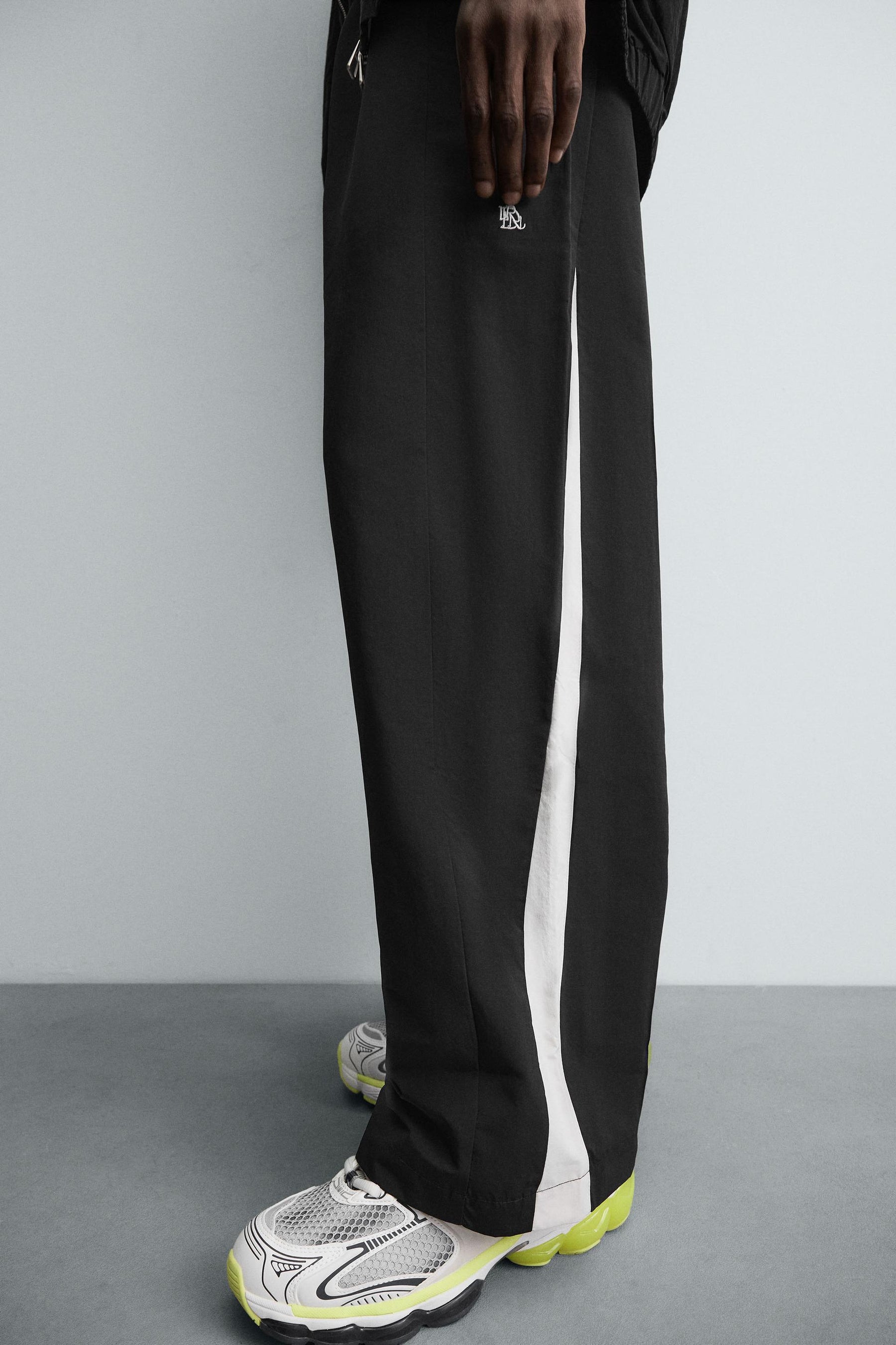 TECHNICAL TROUSERS WITH TAPING - Image 5
