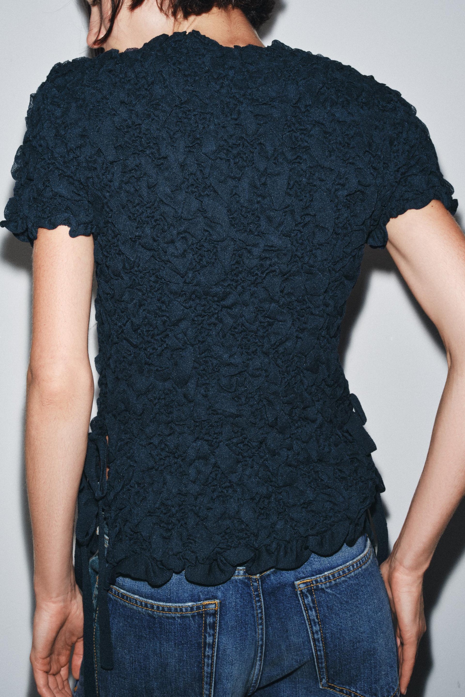 TEXTURED SHORT SLEEVE JUMPER WITH BOWS - Image 3
