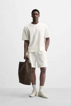 TEXTURED JOGGER BERMUDA SHORTS - Image 1