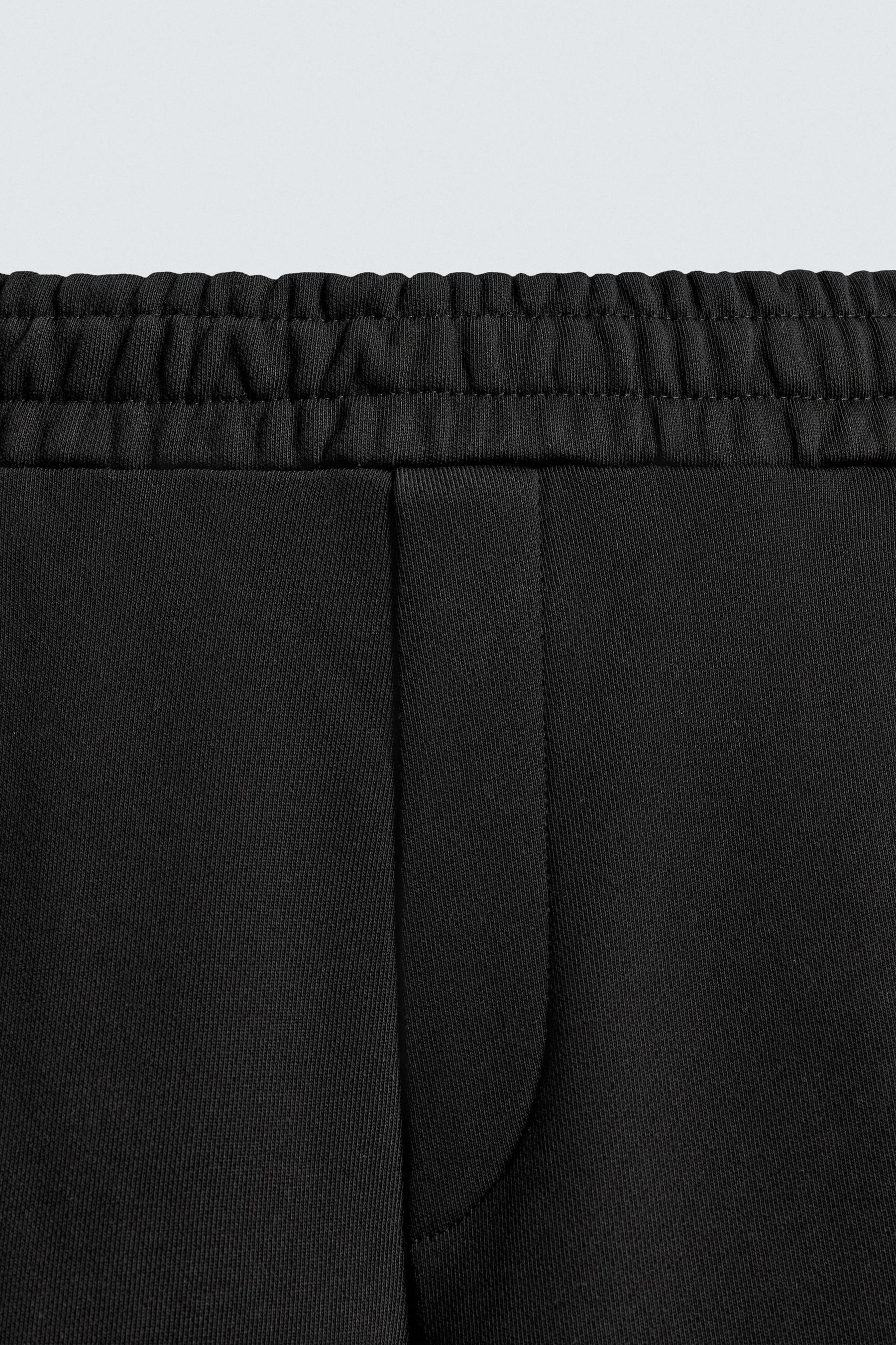 BALLOON TROUSERS WITH TWISTED SEAMS - Image 8