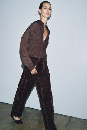 HIGH-WAIST FLOCKED BALLOON JEANS