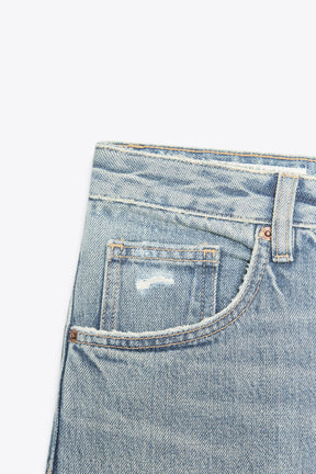 Ripped Mid-Waist Boyfriend Jeans