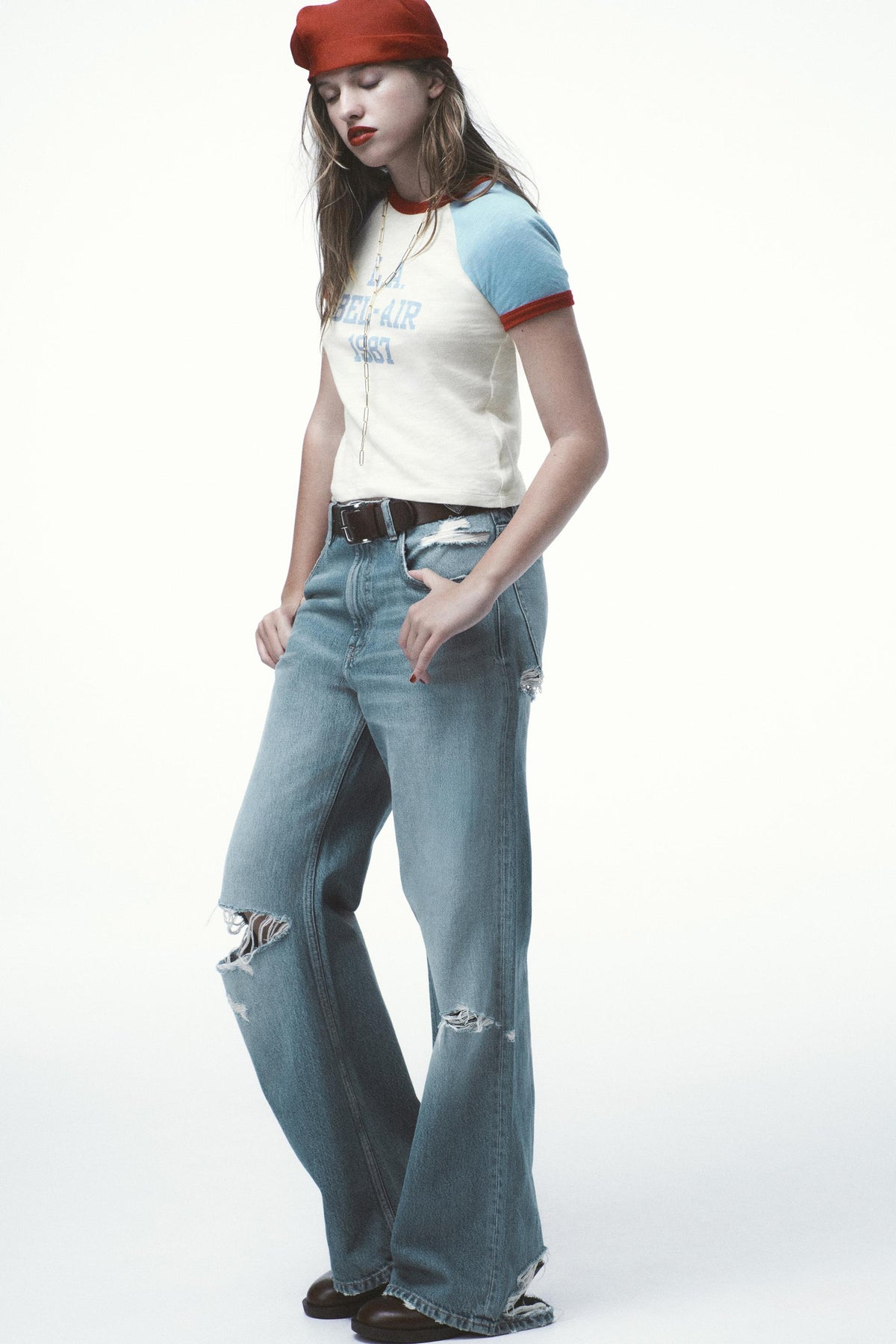 Ripped Mid-Waist Boyfriend Jeans