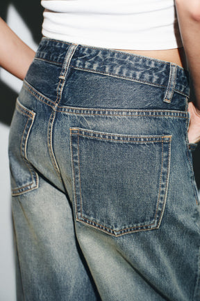 Ripped mid-waist folded jeans