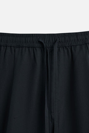 RELAXED FIT LYOCELL TROUSERS - Image 9