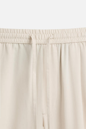 RELAXED FIT LYOCELL TROUSERS - Image 9